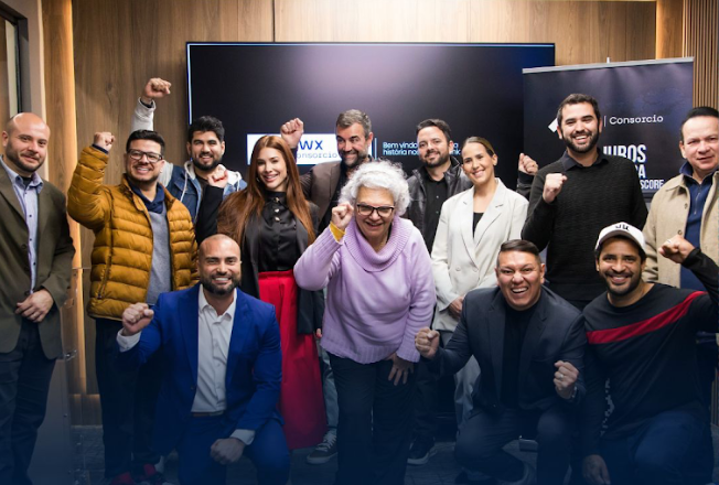 NWX Consorcio team and investors celebrating at an event