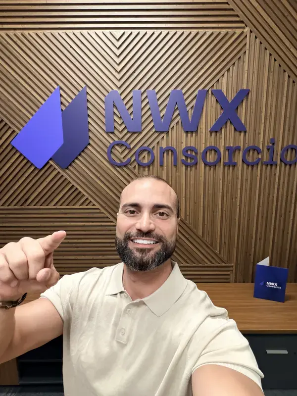 NWX Consorcio headquarters reception with branded logo wall